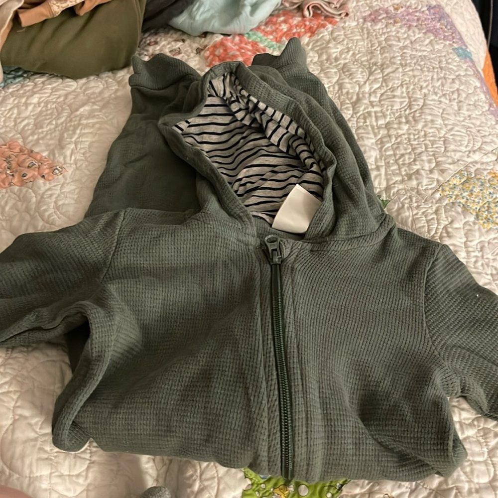 One piece, long sleeve with hood